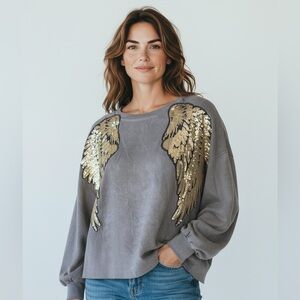 DENIMLAND ladies, lightning bolt, angel wing long sleeve top good condition, M